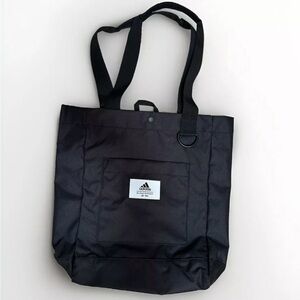 Adidas everyday black tote bag with zip pocket and adjustable straps